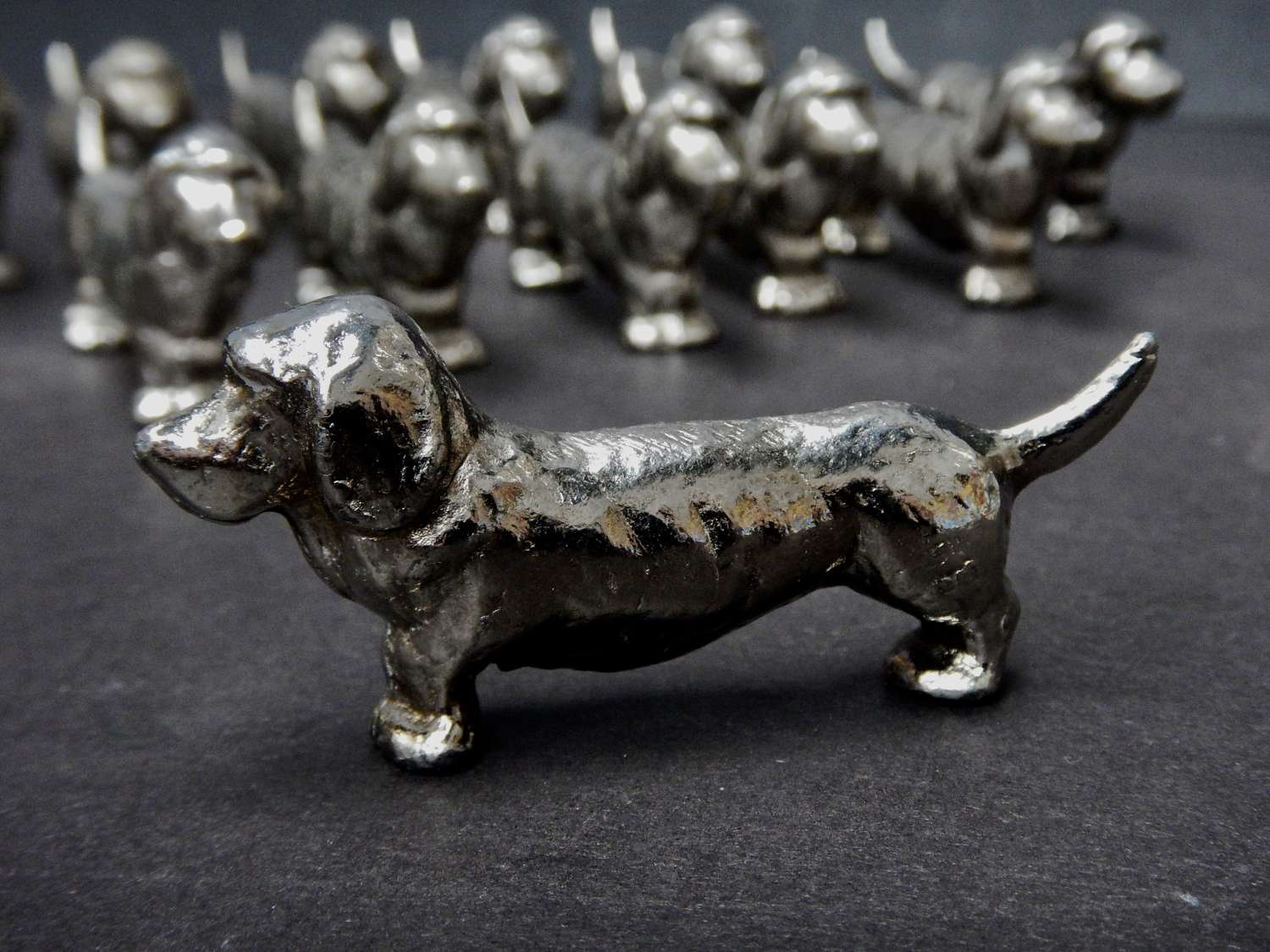 Sixteen Antique French Silver Plated Basset Hound Knife Rests
